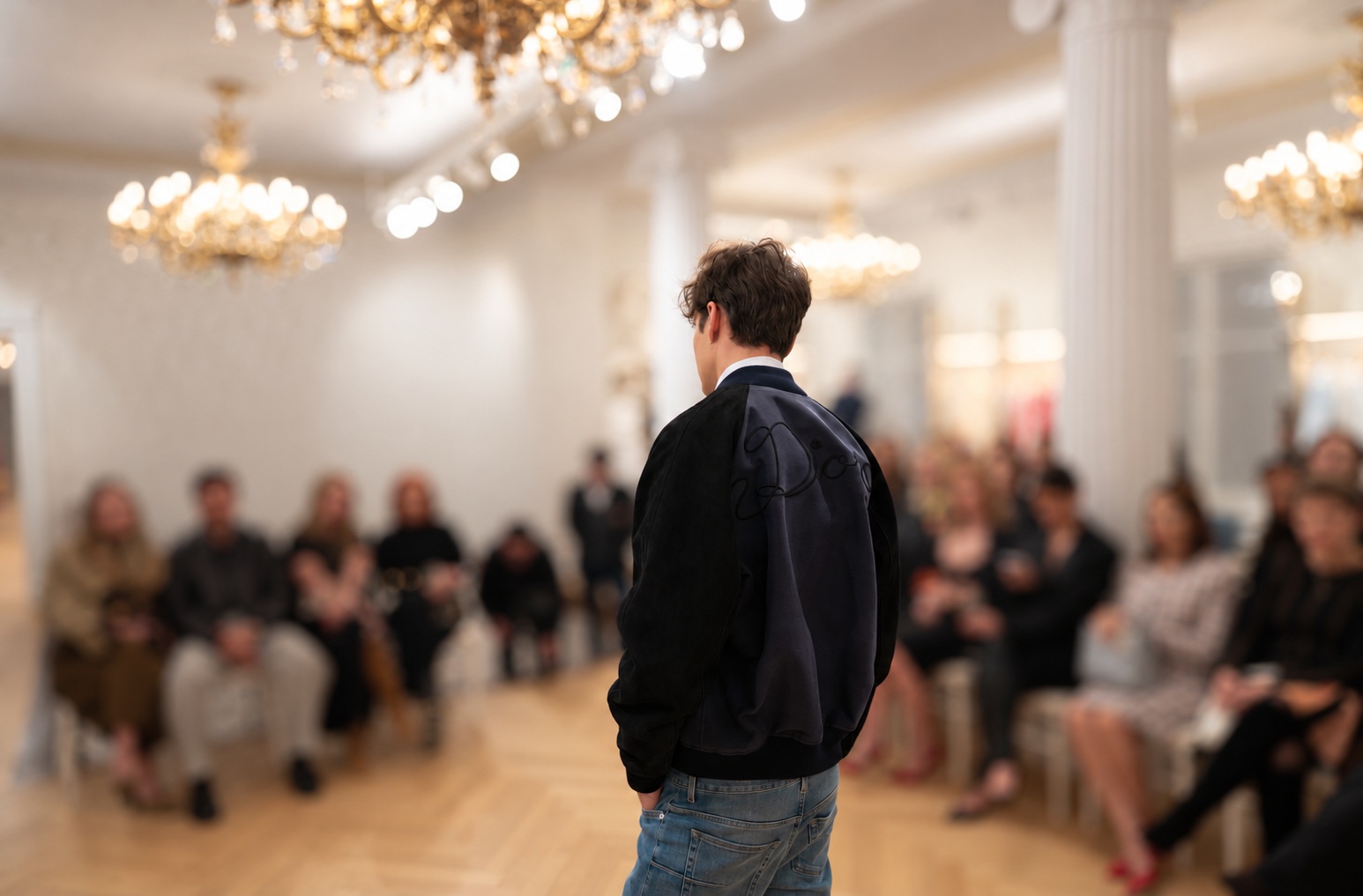 Audience and models at the fashion presentation