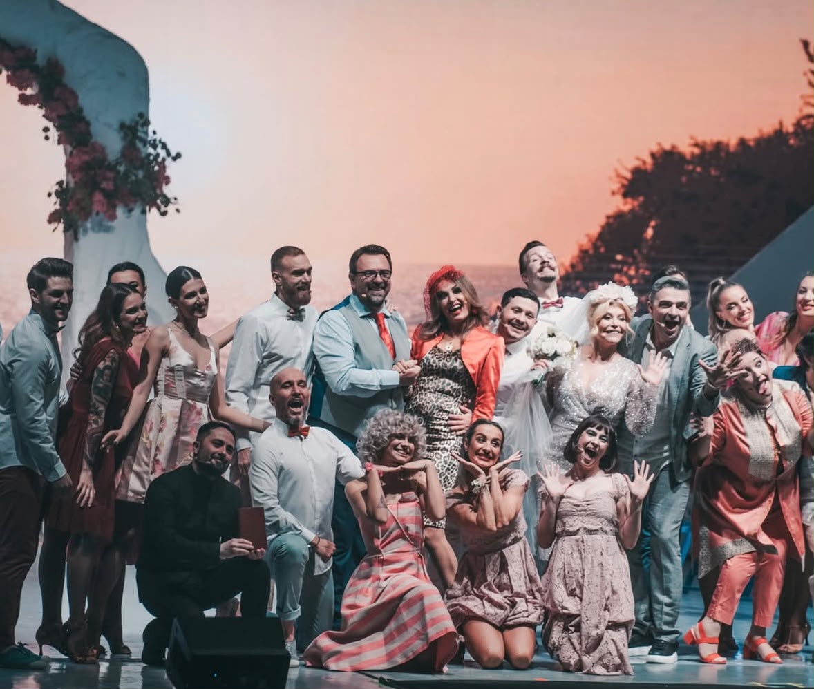 The Mamma Mia company together on stage